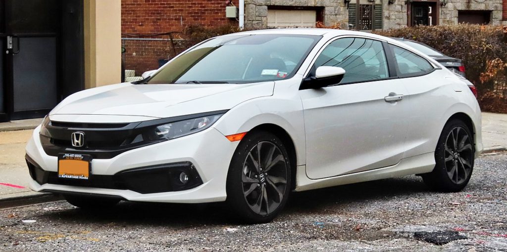 honda civic white colour on a road