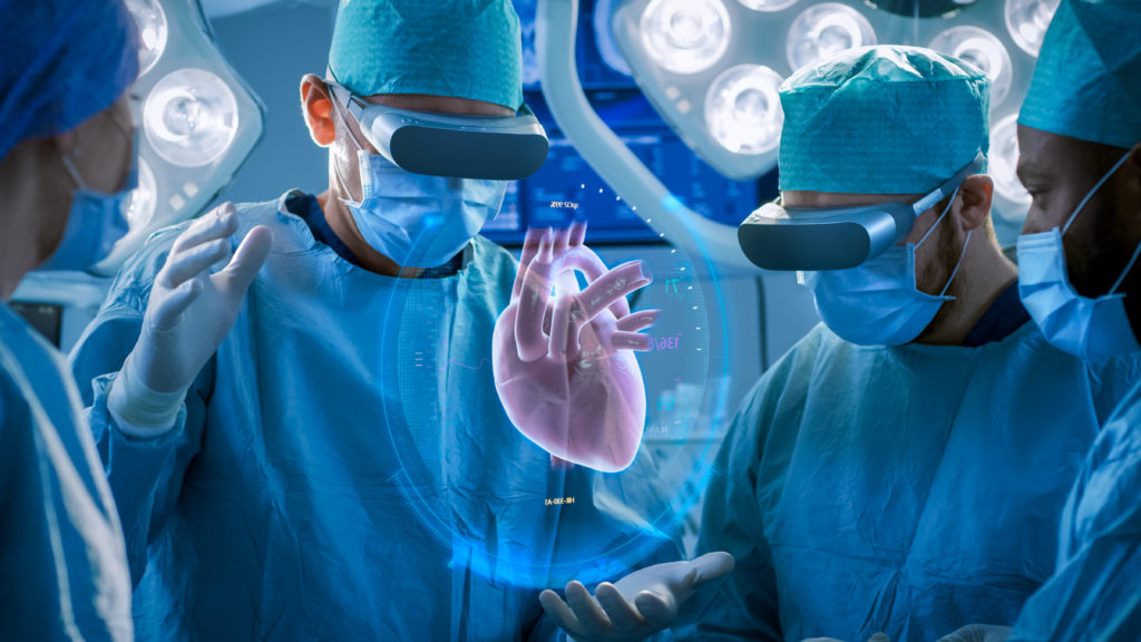 doctors performing heart surgery using MR headsets